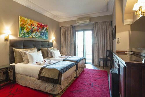 Отель Le Caspien Boutique Hotel, Забронировать Бутик-отель Гелиз Марракеш, рядом с Железнодорожный вокзал Марракеша