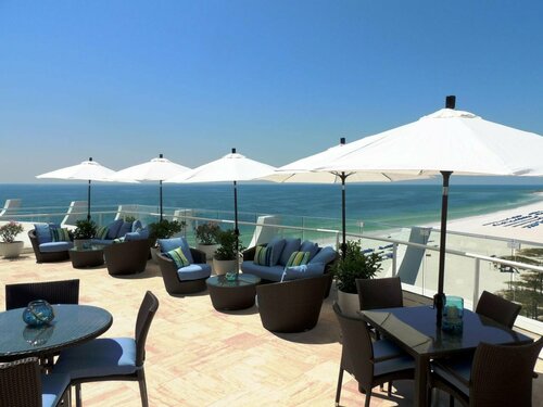 Bellwether Beach Resort, Забронировать Курортный отель Сент-Пит-Бич Clearwater-St Pete Beaches, рядом с Polynesian Putter