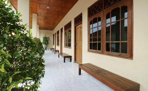 Warapsari Inn by Nida Rooms, Забронировать Отель Кута Бадунг, рядом с Аквапарк Waterbom Park