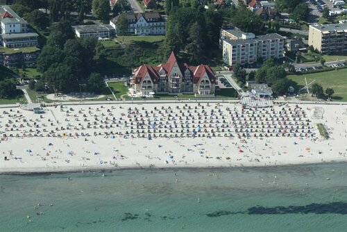 Strandhotel Grömitz, Забронировать Отель Грёмиц земля Шлезвиг-Гольштейн