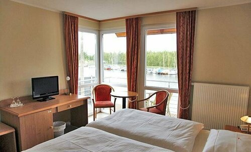 Hotel zur Brücke, Забронировать Отель Грайфсвальд Мекленбург-Померания