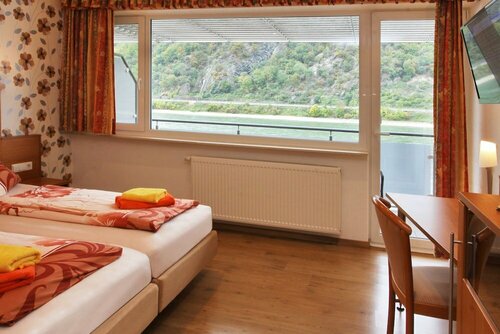 Hotel Rheinkönig, Забронировать Отель Камп-Борнхофен Долина Среднего Рейна