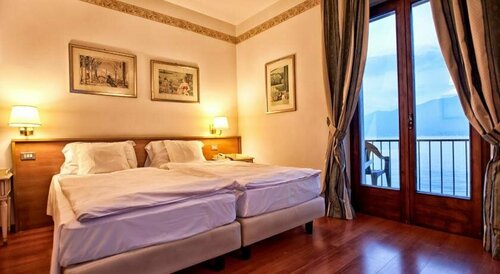 La Caletta Hotel Bolognese, Забронировать Отель Бренцоне-суль-Гарда Garda Veneto