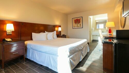 Magnuson Extended Stay and Suites Airport Hotel, Забронировать Отель Отели Dallas - Fort Worth Metropolitan Area с парковкой, Парковка