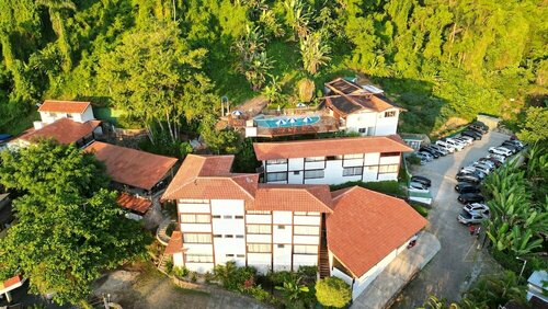 Hotel Coquille, Забронировать Отель Praia Grande Убатуба