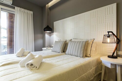 Candia Studios & Rooms, Забронировать Гостевой дом Ираклион Центральный Крит, рядом с Стадион имени Теодороса Вардинояниса