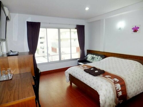 Orchid Inn, Rezervovat Hotel Hotely v Central Thailand se snídaní, Snídaně