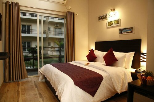 Anandam Clarks Inn Suites Vrindavan, Забронировать Отель Отели Вриндавана с парковкой, Парковка