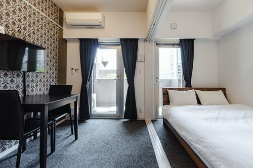 IKIDANE Residential Hotel Hakata Tenjin 2, Забронировать Отель Тэндзин префектура Фукуока, рядом с Bic Camera Tenjin 1st Store