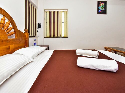 Hare krishna inn, Забронировать Отель Гуруваюр штат Керала