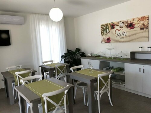 B&B MiMì, Забронировать Отель «постель и завтрак» Отели в центре Порто-Чезарео, в центре, Парковка