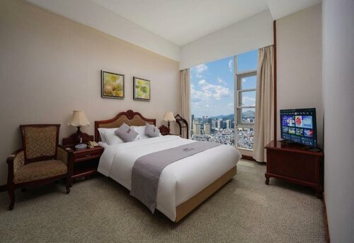 Plateau Pearl Hotel (Kunming Yongzhong Road), Забронировать Отель Гуанду Куньмин, рядом с Xiaodongcun Station