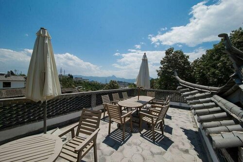 Lijiang Zhuyun boutique Hotel, Забронировать Бутик-отель Лицзян Юньнань, рядом с Улица Сквер-стрит Древнего города Даянь