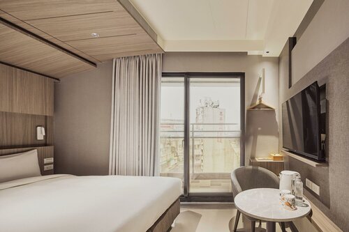 Orange Hotel Ximen Hanzhong, Prenota Hotel Taybey Cina