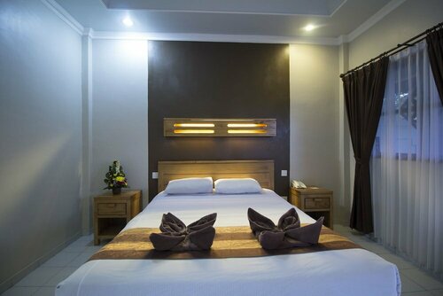 Bakung Sari Resort, Забронировать Курортный отель Недорогие отели Куты, рядом с Площадь Кута, недорогие