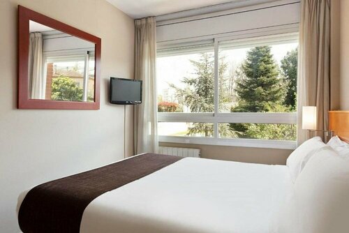 PARK SEDO Aparthotel, Забронировать Отель Отели Руби с парковкой, рядом с Железнодорожная станция Руби, Парковка