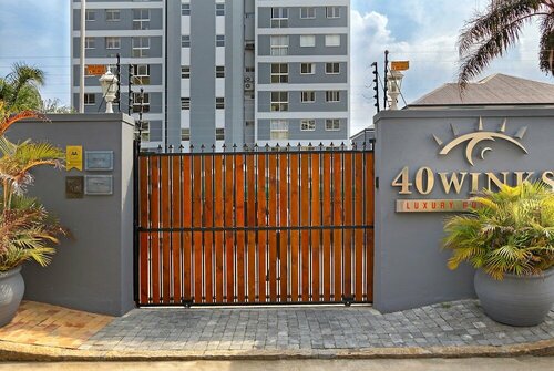 40 Winks Guest House Green Point Cape Town, Забронировать Отель Гринпойнт Кейптаун, рядом с MyCiTi Station Cape Town Stadium