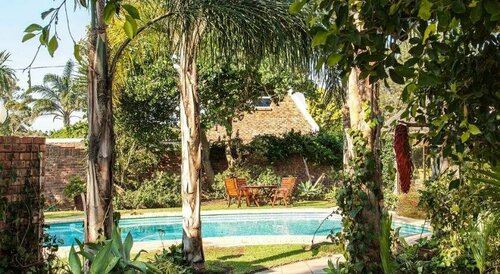 Amani Guest Lodge, Забронировать Гостевой дом Уолмер 