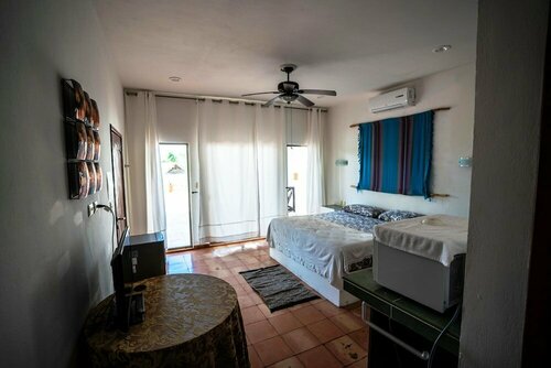 Hotel Boutique Skulls Landing, Забронировать Бутик-отель Отели в центре Исла-Мухереса, в центре
