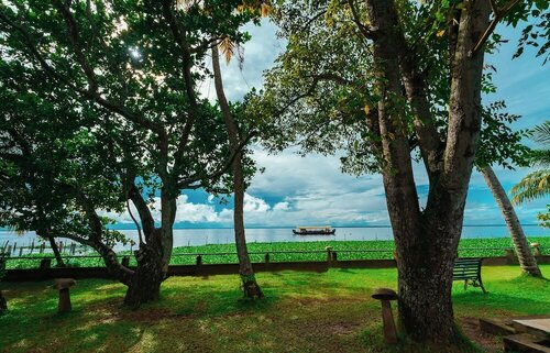 Rhythm Kumarakom, Забронировать Отель Кумараком штат Керала