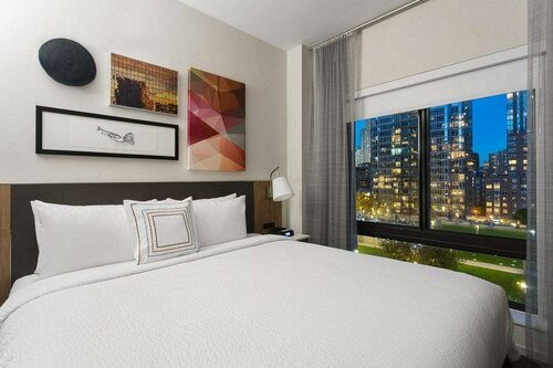 Fairfield Inn & Suites New York Manhattan Central Park, Забронировать Отель Нью-Йорк Нью-Йоркская агломерация, рядом с Станция метро 72-я улица линия Бродвей - Седьмая Авеню