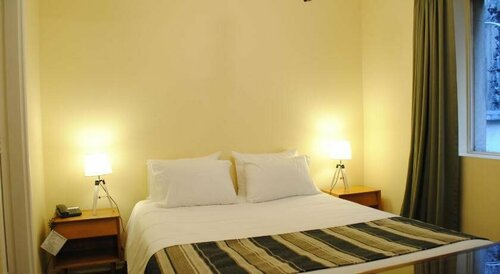 Apart Hotel Carlton House, Забронировать Апарт-отель Сантьяго Столичный регион Сантьяго, рядом с Муниципальный театр Сантьяго