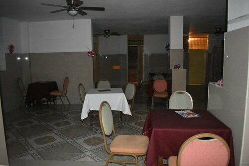 Villa Rosa Hotel & Restaurant, Забронировать Отель Отели Порт-о-Пренс с завтраком, Завтраки