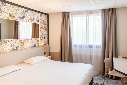 Brit Hotel Nantes La Beaujoire Parc Expo, Забронировать Отель Отели Нанта с парковкой, рядом с Цветочный парк Божуар, Парковка