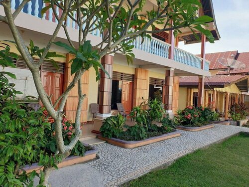 OYO 2208 Thyesza Hotel, Prenota Hotel Unjur Indonesia
