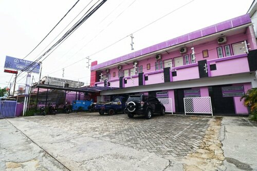 Hasanah Guest House, Rezervovat Penzión Hotely v Pekanbaru s parkováním, Parkování