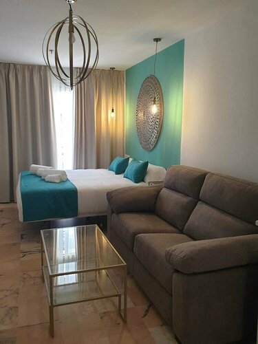Hotel y Apartamentos Doña Lola, Забронировать Отель Отели провинции Севильи с завтраком, Завтраки