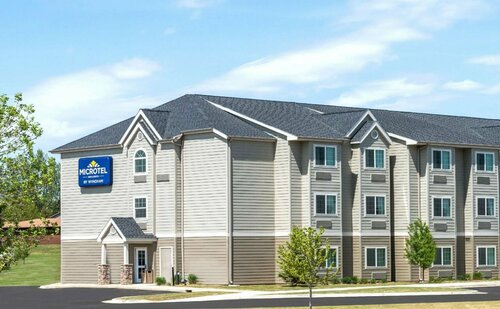 Microtel Inn & Suites by Wyndham Dickinson, Забронировать Отель Дикинсон Theodore Roosevelt National Park, рядом с Музей первых станков