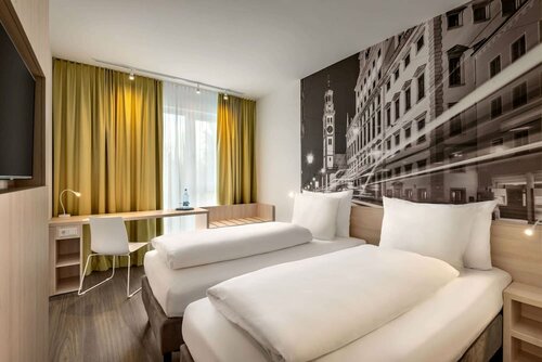 Super 8 by Wyndham Augsburg, Забронировать Отель Отели Аугсбург с парковкой, рядом с Железнодорожный парк Аугсбурга, Парковка