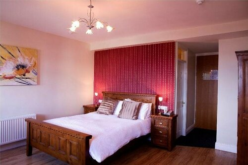 Clonea Strand Hotel, Забронировать Отель Дангарван 