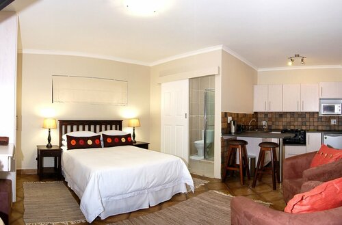 Lalapanzi Guest Lodge, Забронировать Гостевой дом Порт-Элизабет Порт-Элизабет