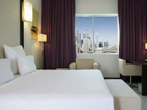 Pullman Dubai Jumeirah Lakes Towers, Забронировать Отель Башни Джумейра Лейк , рядом с Гольф-клуб Emirates