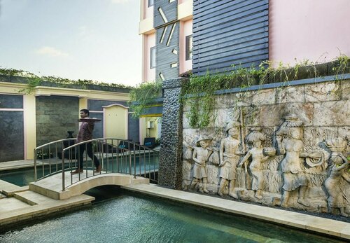 Nida Rooms Uluwatu 1 Jimbaran Beach At 3 Princess Hotel, Забронировать Отель Отели Джимбарана с бассейном, Бассейн