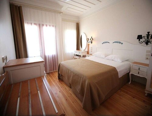 The Krasi Hotel, Забронировать Отель Бозджаада Эгейский регион Турции