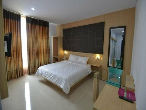 T-One Hotel, Забронировать Отель Джамби провинция Джамби
