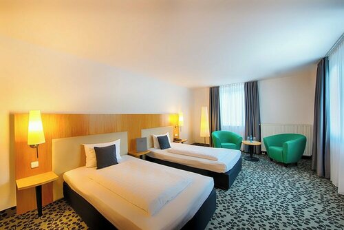Four Points by Sheraton Offenbach Plaza, Забронировать Отель Оффенбах земля Гессен, рядом с Библиотека Оффенбах
