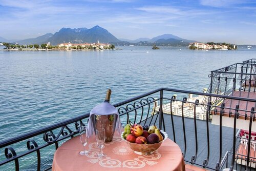 Hotel Romagna, Забронировать Отель Лавено Provincia di Varese