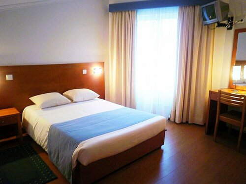 Hotel Arcanjo, Забронировать Отель Лагоа-и-Карвоейру Фару