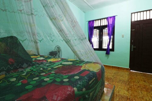 Fadhil Guest House Bukit Lawang RedPartner, Book Pension Hoteller i Bukit Lawang med parkering, Parkering
