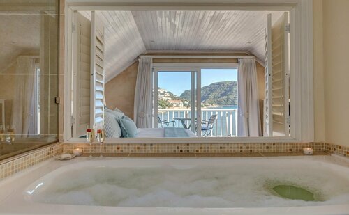 Amanzi Island Boutique Hotel, Забронировать Бутик-отель Leisure Isle 