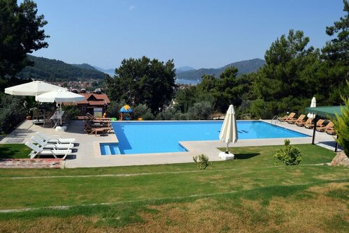 In Forest Göcek, Забронировать Апарт-отель Гёчек район Фетхие