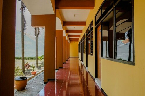 Uniga Malang Family Residence by OYO Rooms, Rezervați Hotel Hoteluri în Malang cu parcare, aproape de Tlogomas Recreation Park, Parcare