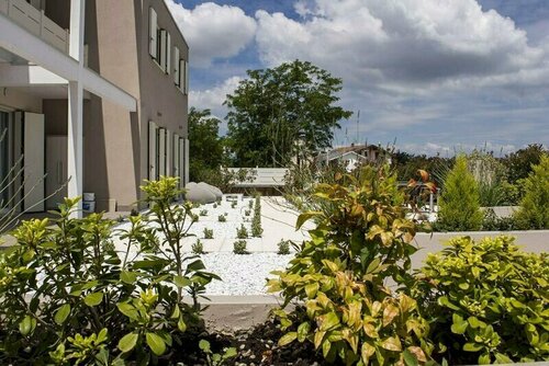 Home Suites Home, Забронировать Отель Валеджо-суль-Минчо Garda Veneto