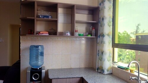 Sunset Paradise Holiday Homes, Varaa Hotelli Hotellit Coast Region uima-altaalla, Uima-allas