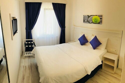 Mauna Hotel, Забронировать Отель Бозджаада Эгейский регион Турции