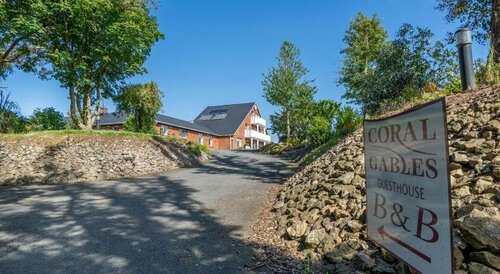 Coral Gables Guesthouse & Campsite, Забронировать Отель Росслар 
